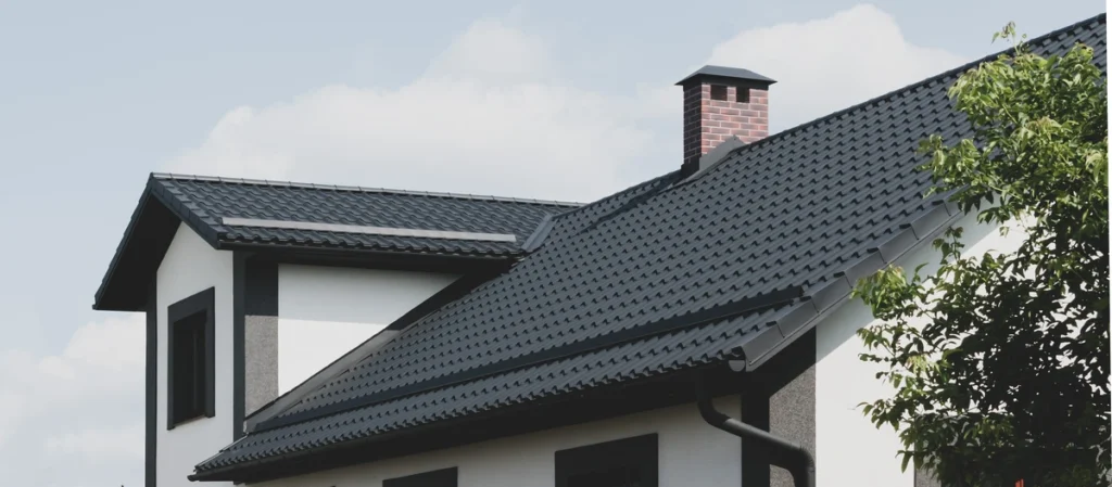Black roof on a white home